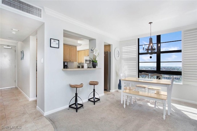 440 Seaview Ct Unit 1106, Marco Island, FL 34145 - dining room featuring a chandelier, plenty of natural light, and ornamental molding