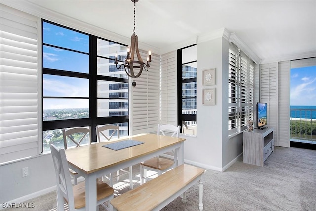 440 Seaview Ct Unit 1106, Marco Island, FL 34145 - dining area featuring a chandelier and carpet