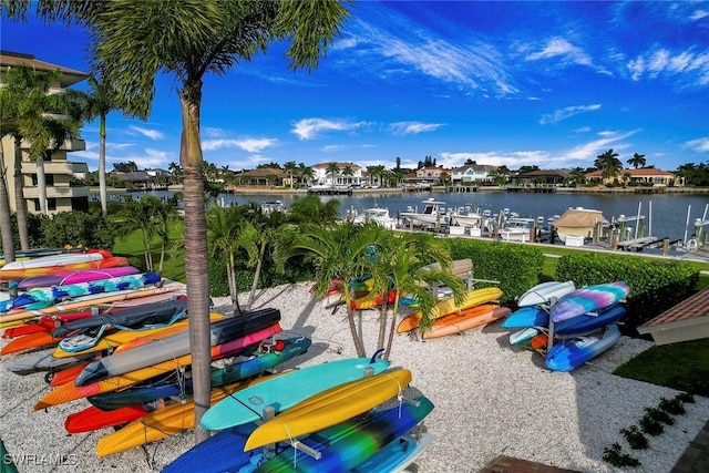 440 Seaview Ct Unit 1106, Marco Island, FL 34145 - water view featuring a boat dock and boat lift