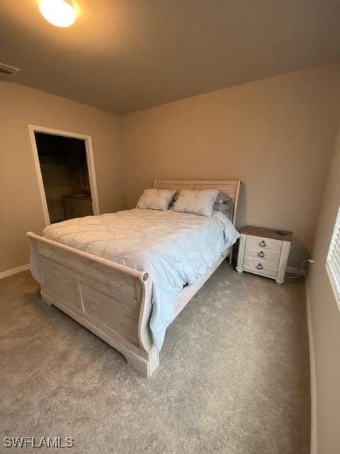 18521 Cronin Sand Ln, North Fort Myers, FL 33917 - bedroom with carpet flooring and baseboards