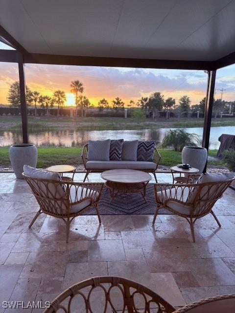18521 Cronin Sand Ln, North Fort Myers, FL 33917 - view of patio with a water view and outdoor lounge area