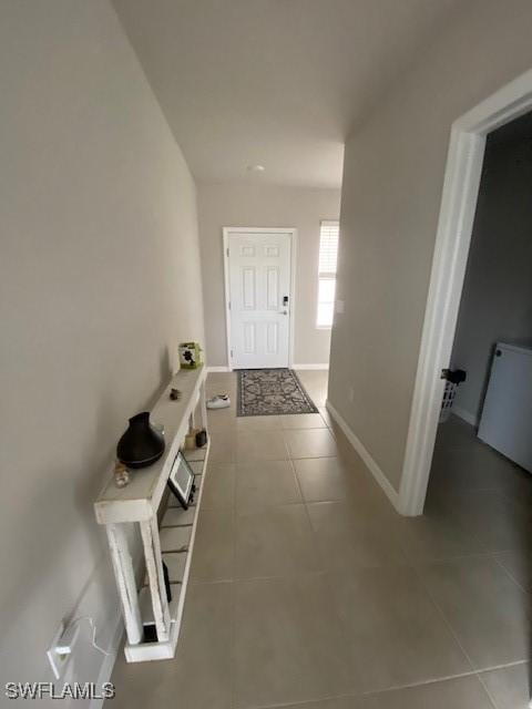 18521 Cronin Sand Ln, North Fort Myers, FL 33917 - mudroom with tile patterned floors and baseboards