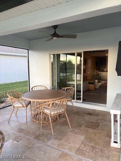 18521 Cronin Sand Ln, North Fort Myers, FL 33917 - view of patio / terrace featuring outdoor dining area and ceiling fan
