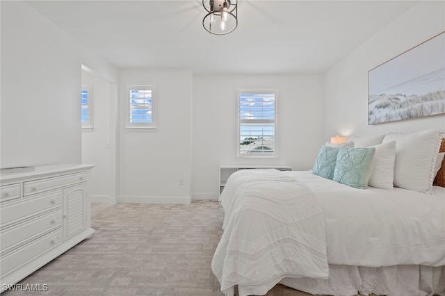 3640 Pilot Cir, Naples, FL 34120 - bedroom with light colored carpet and baseboards
