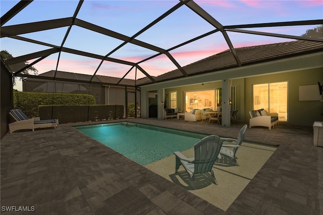 3640 Pilot Cir, Naples, FL 34120 - pool at dusk with an outdoor hangout area, an outdoor pool, and a patio