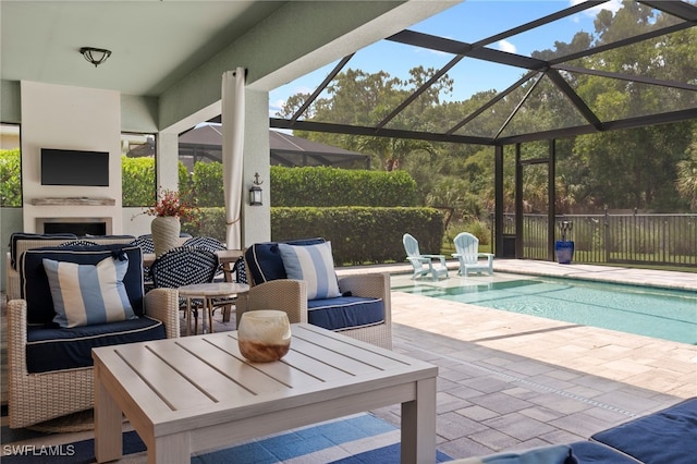 3640 Pilot Cir, Naples, FL 34120 - view of patio / terrace featuring exterior fireplace, a lanai, and outdoor dining space