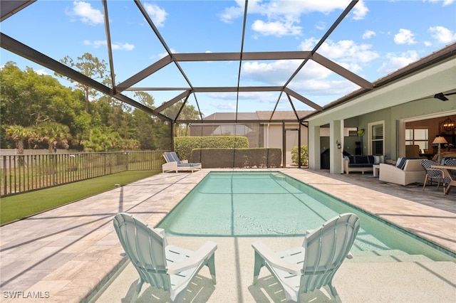 3640 Pilot Cir, Naples, FL 34120 - view of swimming pool featuring a patio, an outdoor living space, and a lanai