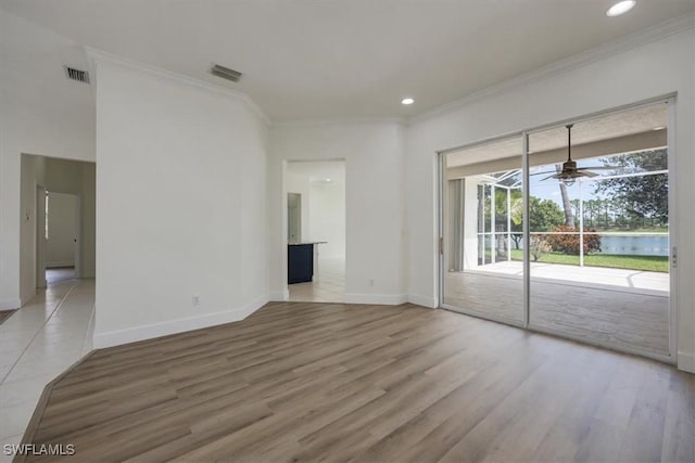 1087 Port Orange Way, Naples, FL 34120 - unfurnished room with ornamental molding, light wood-type flooring, recessed lighting, and ceiling fan