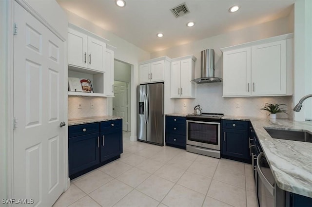 1087 Port Orange Way, Naples, FL 34120 - kitchen with stainless steel appliances, wall chimney range hood, white cabinets, light stone countertops, and open shelves