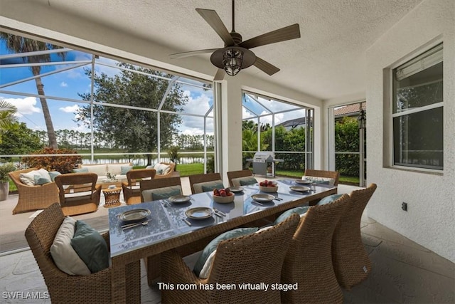 1087 Port Orange Way, Naples, FL 34120 - sunroom with ceiling fan, outdoor lounge area, and a water view