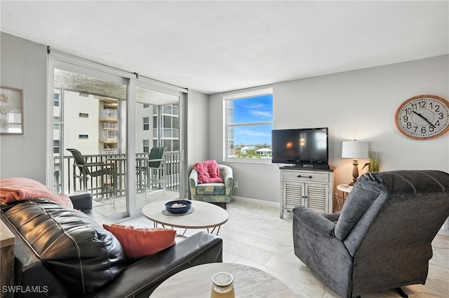 5600 Bonita Beach Rd Unit 4-605, Bonita Springs, FL 34134 - living room with baseboards