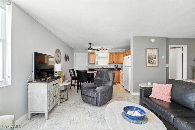 5600 Bonita Beach Rd Unit 4-605, Bonita Springs, FL 34134 - living area with a ceiling fan and light marble finish flooring
