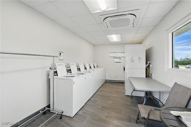 5600 Bonita Beach Rd Unit 4-605, Bonita Springs, FL 34134 - shared laundry room featuring washing machine and clothes dryer