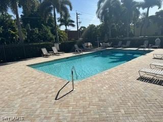 4400 Lazio Way Unit 201, Fort Myers, FL 33901 - community pool with a patio area