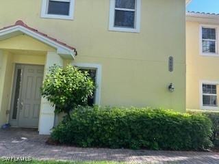 4400 Lazio Way Unit 201, Fort Myers, FL 33901 - entrance to property with stucco siding