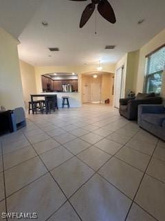 4400 Lazio Way Unit 201, Fort Myers, FL 33901 - tiled living area featuring ceiling fan