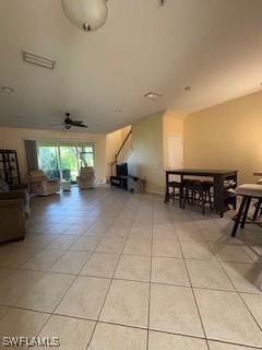 4400 Lazio Way Unit 201, Fort Myers, FL 33901 - living area with light tile patterned floors and ceiling fan
