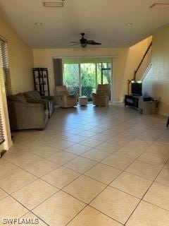 4400 Lazio Way Unit 201, Fort Myers, FL 33901 - living area with a ceiling fan and light tile patterned flooring
