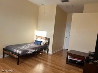 4400 Lazio Way Unit 201, Fort Myers, FL 33901 - bedroom with wood finished floors