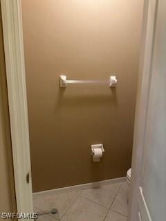 4400 Lazio Way Unit 201, Fort Myers, FL 33901 - bathroom featuring toilet and tile patterned floors