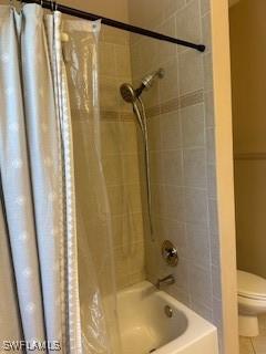 4400 Lazio Way Unit 201, Fort Myers, FL 33901 - full bath with shower / bath combo and tile patterned flooring