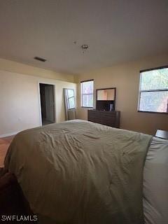 4400 Lazio Way Unit 201, Fort Myers, FL 33901 - bedroom with multiple windows