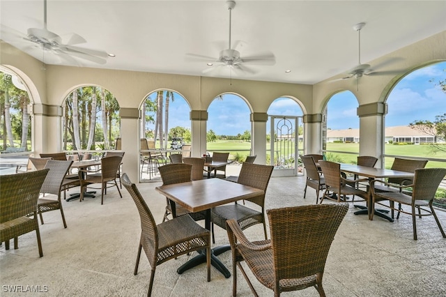 866 Marblehead Dr Unit H6, Naples, FL 34104 - view of patio / terrace with ceiling fan, outdoor dining space, and view of golf course