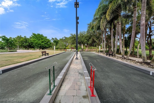 866 Marblehead Dr Unit H6, Naples, FL 34104 - view of road featuring curbs and view of scattered trees