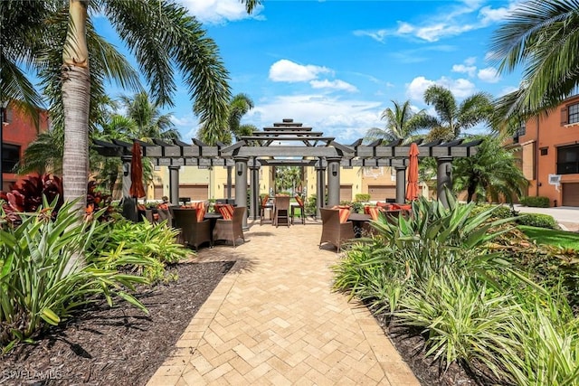 11758 Izarra Way Unit 7703, Fort Myers, FL 33912 - view of patio / terrace featuring a pergola