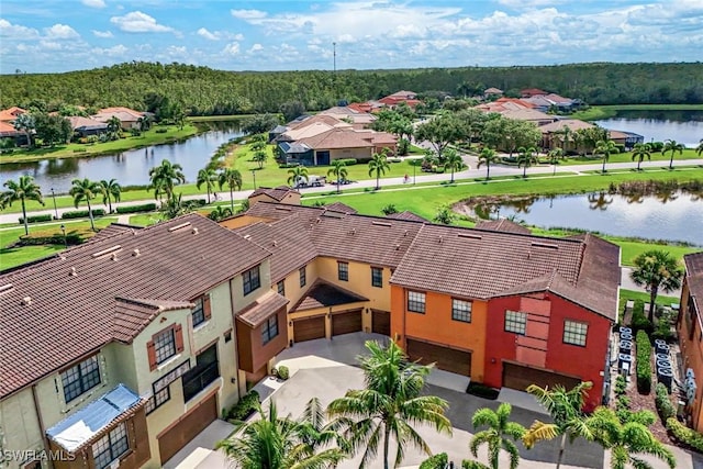 11758 Izarra Way Unit 7703, Fort Myers, FL 33912 - aerial perspective of suburban area with a nearby body of water