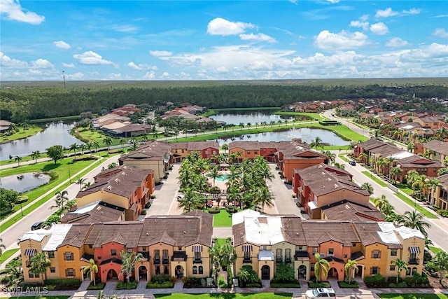 11758 Izarra Way Unit 7703, Fort Myers, FL 33912 - aerial view of residential area with a nearby body of water