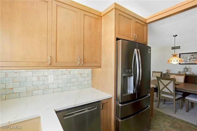 25710 Hickory Blvd Unit A 202, Bonita Springs, FL 34134 - kitchen with appliances with stainless steel finishes, decorative backsplash, light stone countertops, and hanging light fixtures