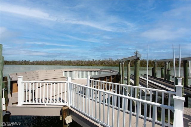25710 Hickory Blvd Unit A 202, Bonita Springs, FL 34134 - wooden terrace with a water view and a dock