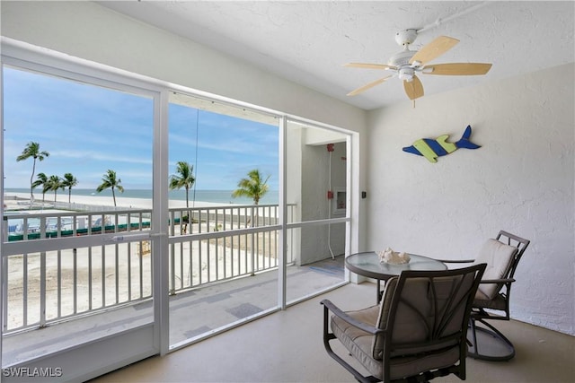 25710 Hickory Blvd Unit A 202, Bonita Springs, FL 34134 - sunroom / solarium featuring healthy amount of natural light and view of water and beach