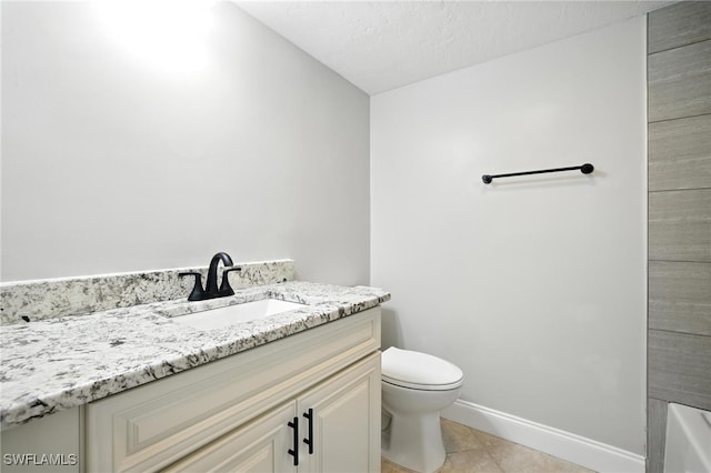 16001 Dublin Cir Unit 103, Fort Myers, FL 33908 - bathroom featuring vanity, tile patterned flooring, a bath, and a textured ceiling