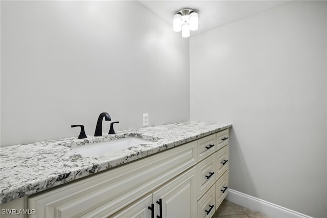 16001 Dublin Cir Unit 103, Fort Myers, FL 33908 - bathroom with vanity and tile patterned flooring