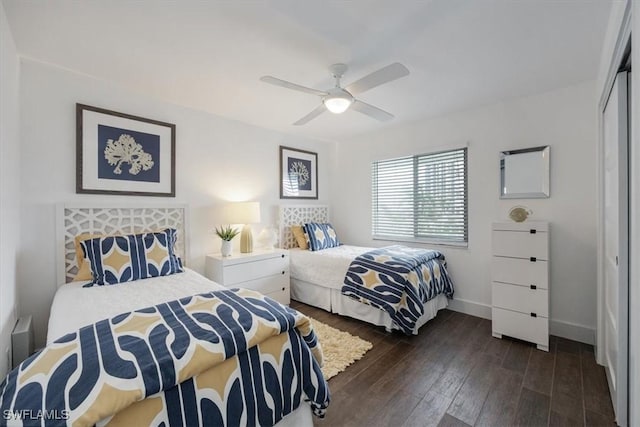 10682 Gulf Shore Dr Unit C302, Naples, FL 34108 - bedroom featuring a closet, dark wood-style flooring, and ceiling fan