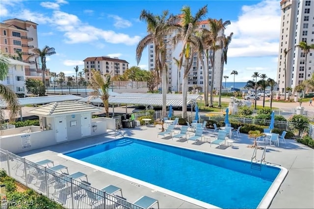 10682 Gulf Shore Dr Unit C302, Naples, FL 34108 - community pool with a patio
