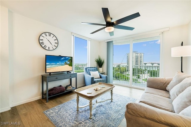 8771 Estero Blvd Unit 607, Fort Myers Beach, FL 33931 - living room with wood finished floors and a ceiling fan