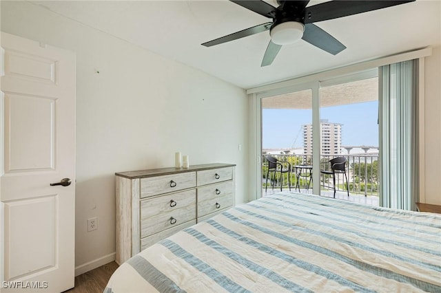 8771 Estero Blvd Unit 607, Fort Myers Beach, FL 33931 - bedroom with access to outside, dark wood finished floors, and a ceiling fan