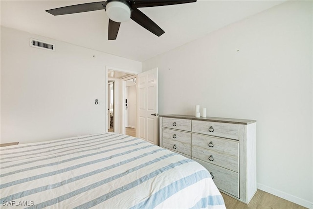 8771 Estero Blvd Unit 607, Fort Myers Beach, FL 33931 - bedroom featuring light wood-type flooring and ceiling fan