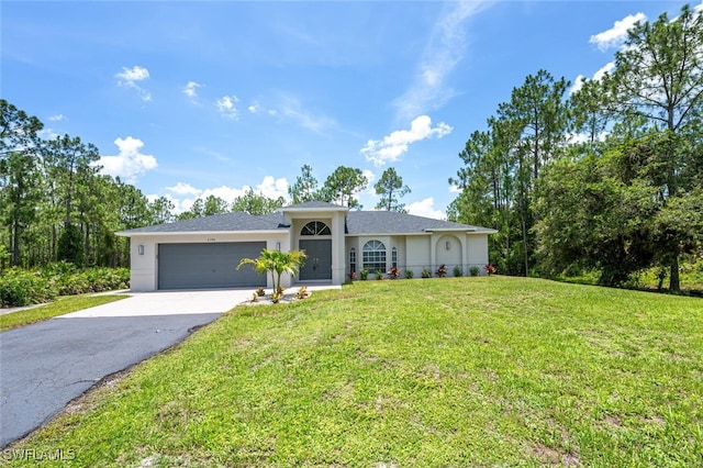 2790 Randall Blvd, Naples, FL 34120 - ranch-style home featuring asphalt driveway, a garage, a front lawn, and stucco siding