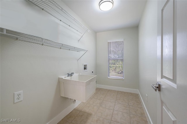 2790 Randall Blvd, Naples, FL 34120 - washroom featuring washer hookup, electric dryer hookup, and light tile patterned floors