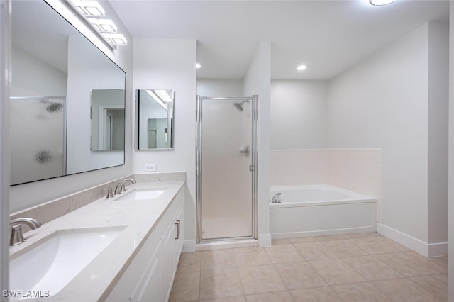 2790 Randall Blvd, Naples, FL 34120 - bathroom featuring a shower stall, a garden tub, double vanity, tile patterned flooring, and recessed lighting