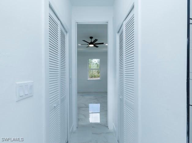 3103 13th St SW, Lehigh Acres, FL 33976 - corridor with marble look tile flooring