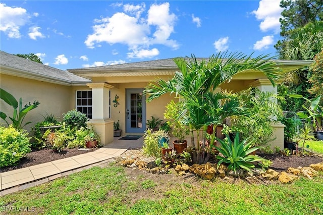 873 Spaulding St E, Lehigh Acres, FL 33974 - entrance to property with stucco siding