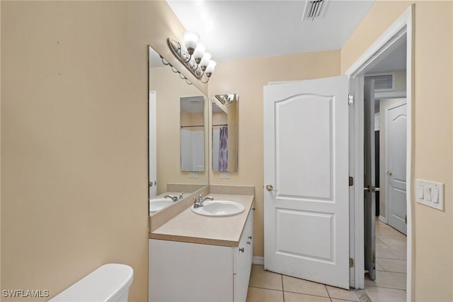 873 Spaulding St E, Lehigh Acres, FL 33974 - half bath with tile patterned flooring and vanity