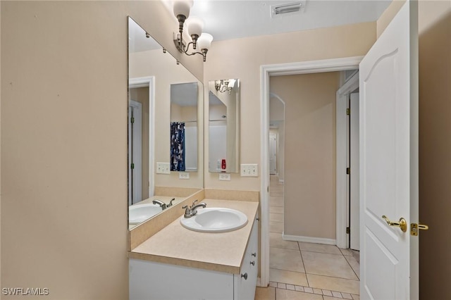 873 Spaulding St E, Lehigh Acres, FL 33974 - bathroom featuring vanity and tile patterned flooring