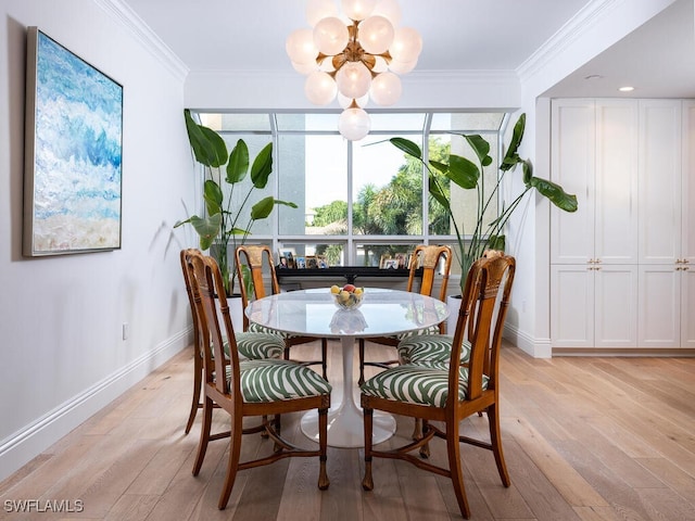 8440 Abbington Cir Unit D22, Naples, FL 34108 - dining space featuring a chandelier, light wood finished floors, and crown molding