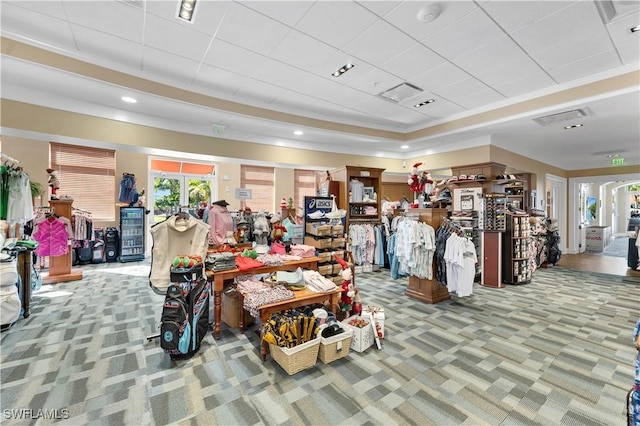 4844 Hampshire Ct Unit 305, Naples, FL 34112 - misc room with carpet floors, a tray ceiling, and crown molding